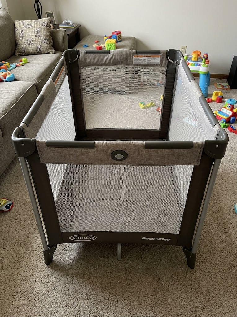 Playard set up in the living room, full frame